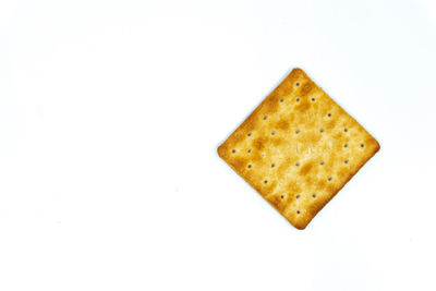 High angle view of bread on white background