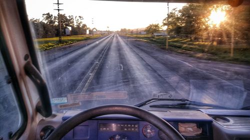 Close-up of vehicle seen through car windshield