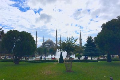 Panoramic view of temple against cloudy sky