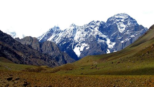 Scenic view of snowcapped mountain against sky