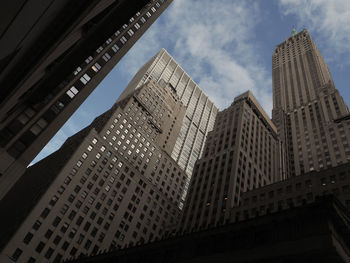 Low angle view of modern buildings against sky