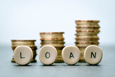 Close-up of coins on table