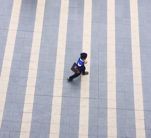 High angle view of boy walking