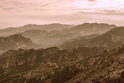 Scenic view of mountains against sky during sunset