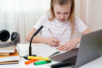 Girl attending online class