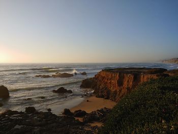 Scenic view of sea against sky during sunset