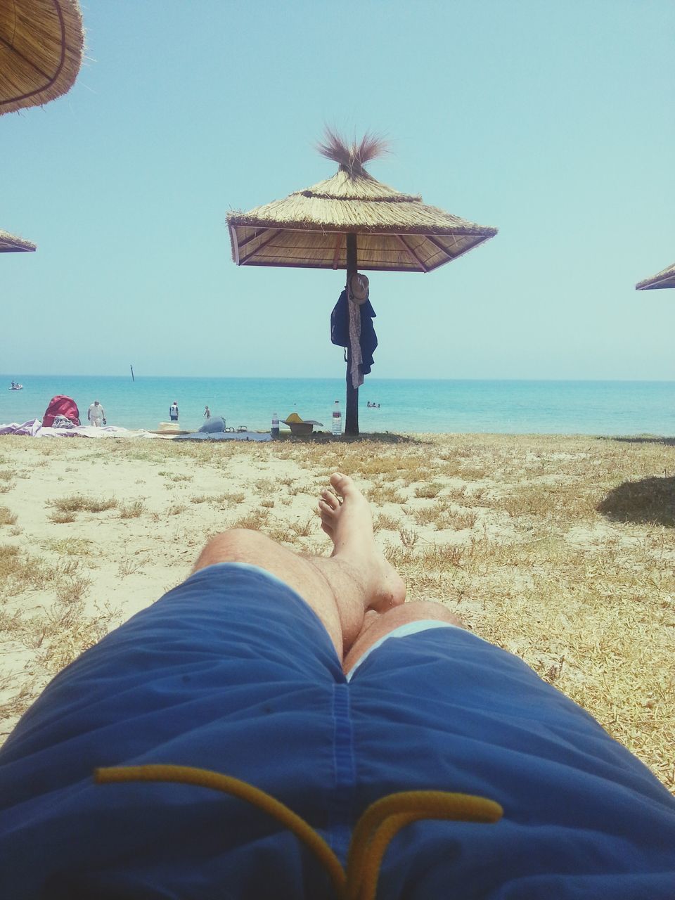 sea, beach, horizon over water, leisure activity, lifestyles, sand, water, person, low section, shore, blue, vacations, barefoot, summer, personal perspective, sky