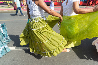 Cultural group of women dancing is seen during the fuzue pre-carnival in the city of salvador