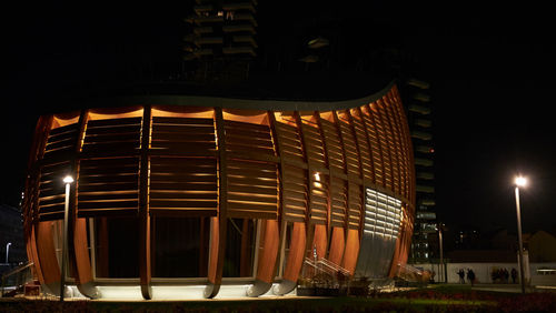 Low angle view of illuminated building at night