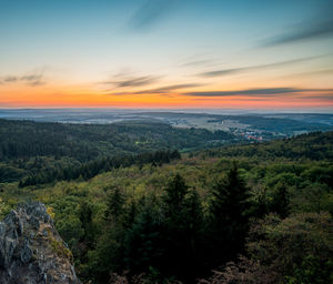 Scenic view of landscape against sky during sunset