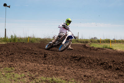 Motocross racer taking a curve