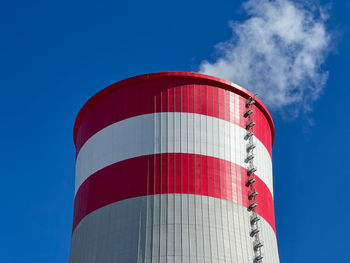 Low angle view of building against blue sky