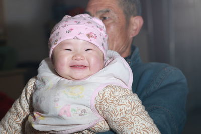 Portrait of cute baby boy at home