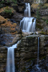 View of waterfall in forest