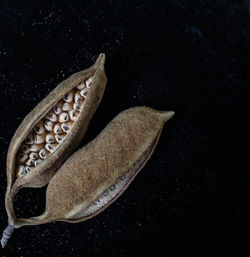 High angle view of shoes on table against black background