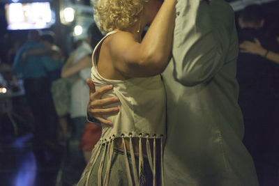 Man and woman dancing at nightclub