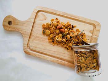 High angle view of food on table against white background