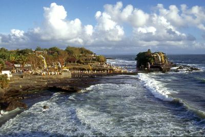 Scenic view of sea against cloudy sky