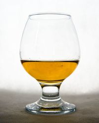 Close-up of beer glass on table