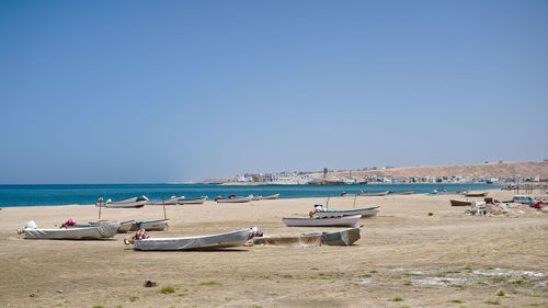 Scenic view of beach against clear sky