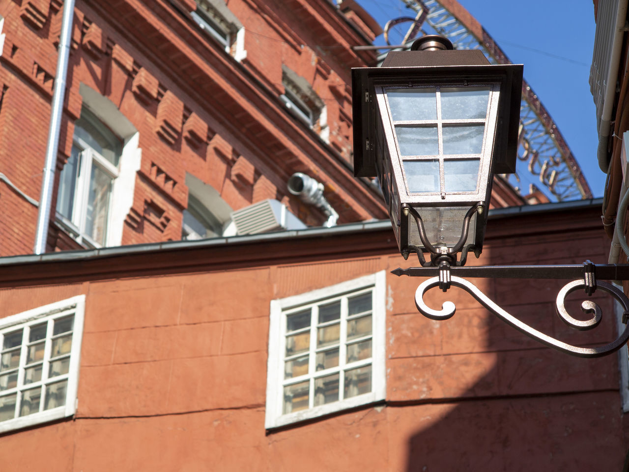 LOW ANGLE VIEW OF STREET LIGHT AND BUILDING