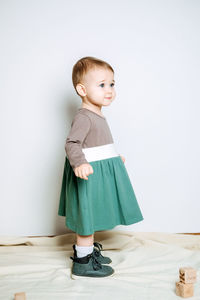 Baby fashion. unisex color clothes for babies. cute baby girls in neutral color palette cotton