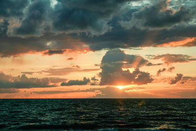 Scenic view of sea against sky during sunset