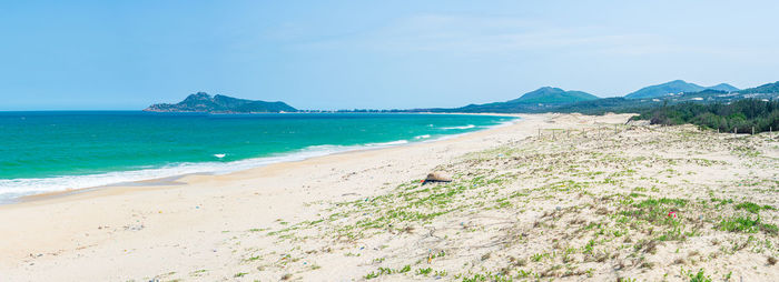 Scenic view of beach against sky