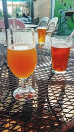 Close-up of beer glass on table at restaurant