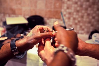 Close-up of hands working