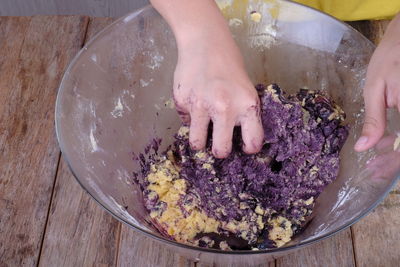 High angle view of person preparing food