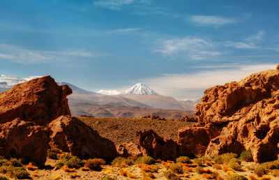 Scenic view of snowcapped mountains against sky