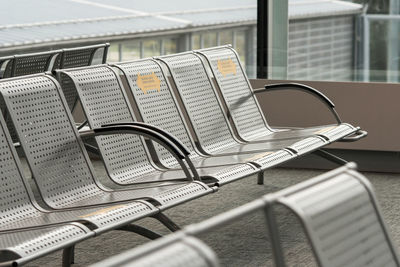 Close-up of empty seats at the airport