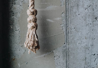 Close-up of clothes hanging on wall