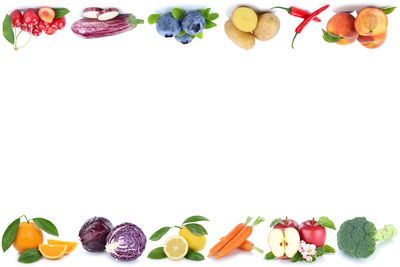 Close-up of fruits against white background
