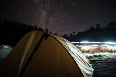 Panoramic view of tent against sky at night