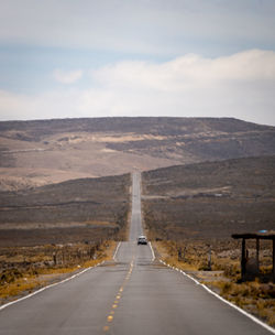 Empty road against sky