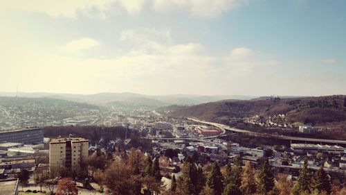 Aerial view of cityscape against sky