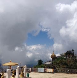 Built structure against cloudy sky