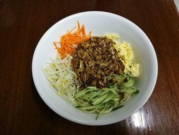 High angle view of salad in bowl on table