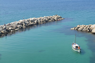High angle view of groyne in sea