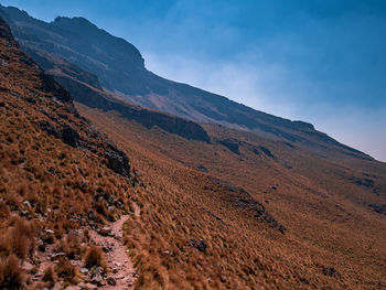 Scenic view of rocky mountains against sky