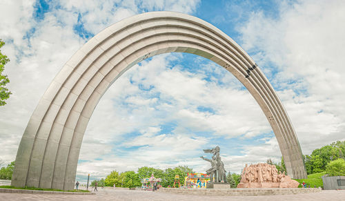 Low angle view of statue against cloudy sky