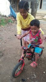 Boy riding bicycle