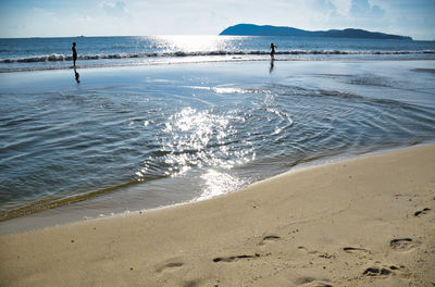 Scenic view of beach against sky