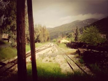 Scenic view of landscape against cloudy sky