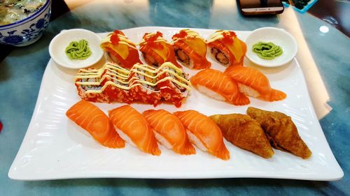 High angle view of sushi served on table