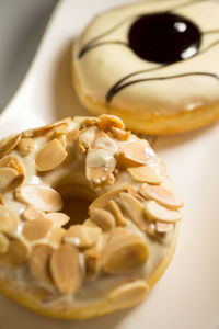 High angle close-up of donuts served in plate