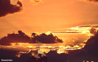 Low angle view of dramatic sky during sunset