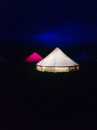 Tent against sky at night